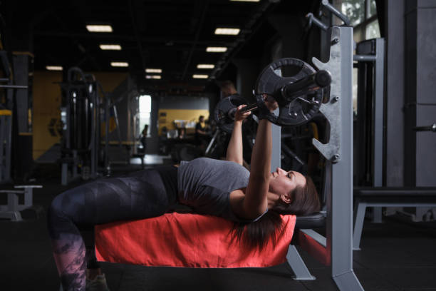 istock Sportswoman training at the gym 1412930424
