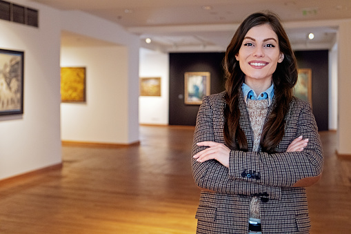 Portrait of exhibition manager/visitor in a gallery