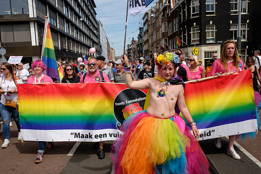 Amsterdam - July 30: Pride Amsterdam 2022 kicks off with Pride Walk on July 30, 2022 in Amsterdam, The Netherlands. This annual event is meant to celebrate freedom and diversity.