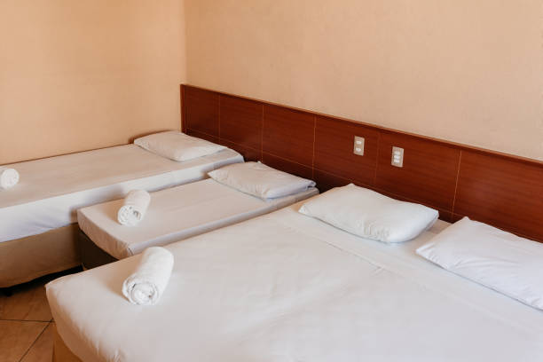 istock Hotel - hotel room with beds and decor 1412944354