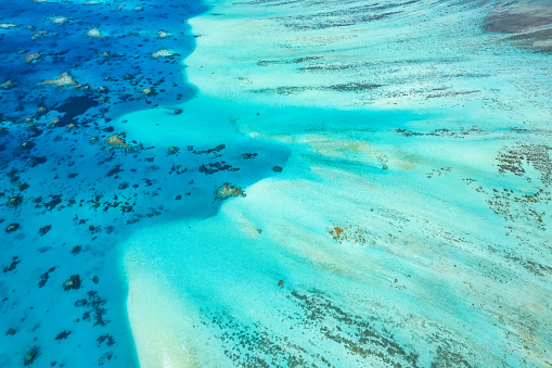 Aerial drone view of coral reef in Maldives