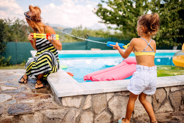 istock Family Water Fight 1412948682