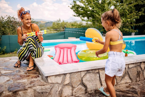 istock Family Water Fight 1412948684