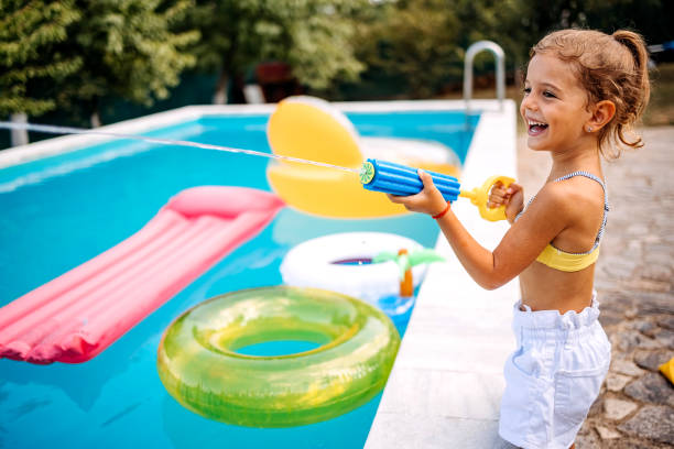 istock Child with water gun 1412948861