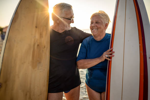 istock Active senior couple at the beach 1412952438