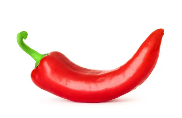 Photo of Spicy and tasty glossy red pepper isolated with clipping path on a white background with shadow. The concept of organic eco food and vegetables