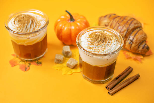 istock Pumpkin spiced Latte Coffee with whipped cream in a glass 1412955867