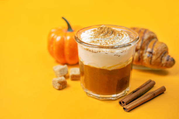 istock Pumpkin spiced Latte Coffee with whipped cream in a glass 1412955869
