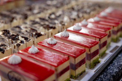 Traditional Turkish delight, sweets, nougat, on the market showcase in assortment. Selective focus.