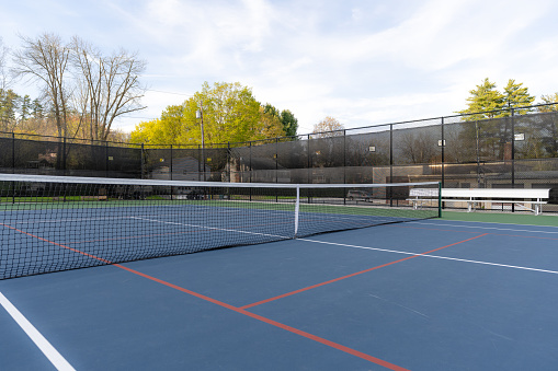 New blue tennis courts with white lines and red pickleball lines