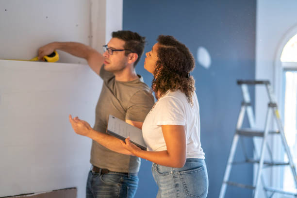 istock Young Couple Doing a Home Renovation 1412959932