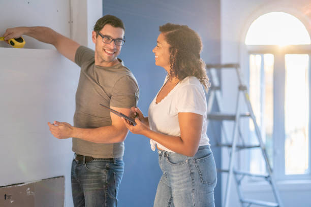 istock Young Couple Doing a Home Renovation 1412959938