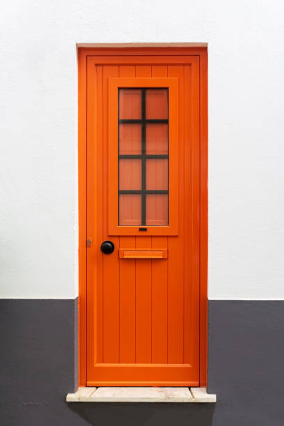 istock New closed modern bright orange door 1412962520