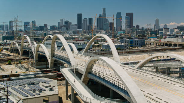 Aerial View of 6th Street Bridge and Downtown Skyline in Los Angeles, California Aerial shot of the new Sixth Street Viaduct connecting  the Downtown Los Angeles Arts District to Boyle Heights across the Los Angeles River. sixth street bridge stock pictures, royalty-free photos & images