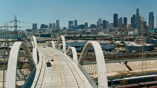 Aerial shot of the new Sixth Street Viaduct connecting  the Downtown Los Angeles Arts District to Boyle Heights across the Los Angeles River.