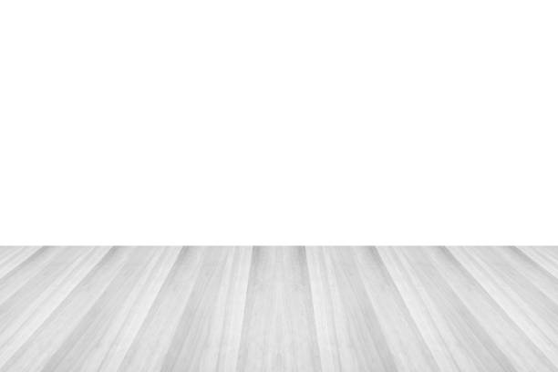 istock Empty white wooden table top isolated on white background 1412972110