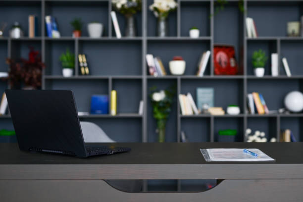 istock Table with laptop in home office interior. 1412972194