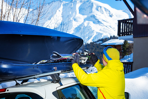 Winter, ski - skiers enjoying lunch in winter mountains