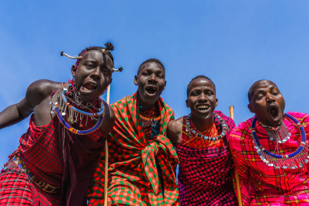 istock Maasai Mara man showing traditional Maasai jumping dance 1412975687