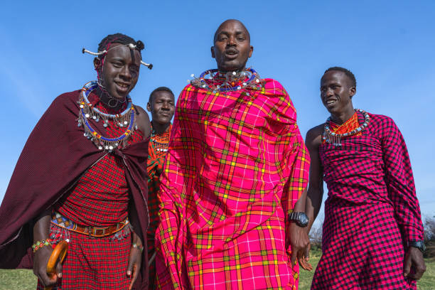istock Maasai Mara man showing traditional Maasai jumping dance 1412975690