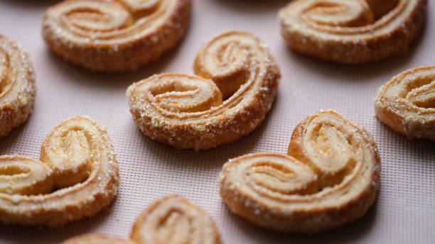 istock Yummy puff pastry cookies with sugar sprinkle 1412977495