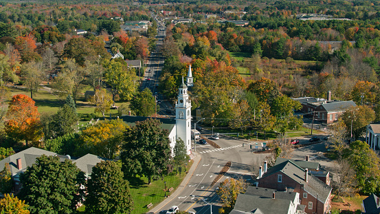 Aerial shot of Kennebunk, Maine in Autumn, with Fall colors on the trees. Kennebunk is a small town in York County, famous for early American architecture.