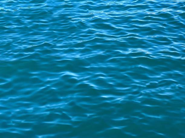 istock Blue sea water waves background. 1412979874