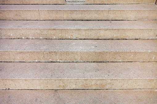 Gray concrete stairs, unfinished concrete stairs, stairs in minimalist architecture