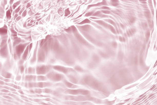 istock pink white water wave, natural swirl pattern texture background, abstract summer photography 1412984255
