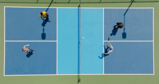 istock Drone Shot Looking Straight Down on Pickleball Doubles Game 1412985109