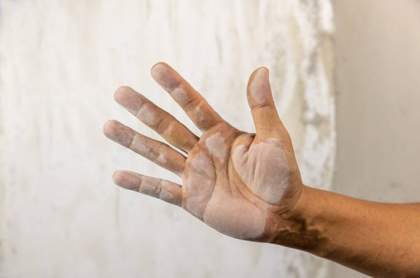 istock Chalking powder occurs when touching the color wall deterioration due to long usage. 1412989192