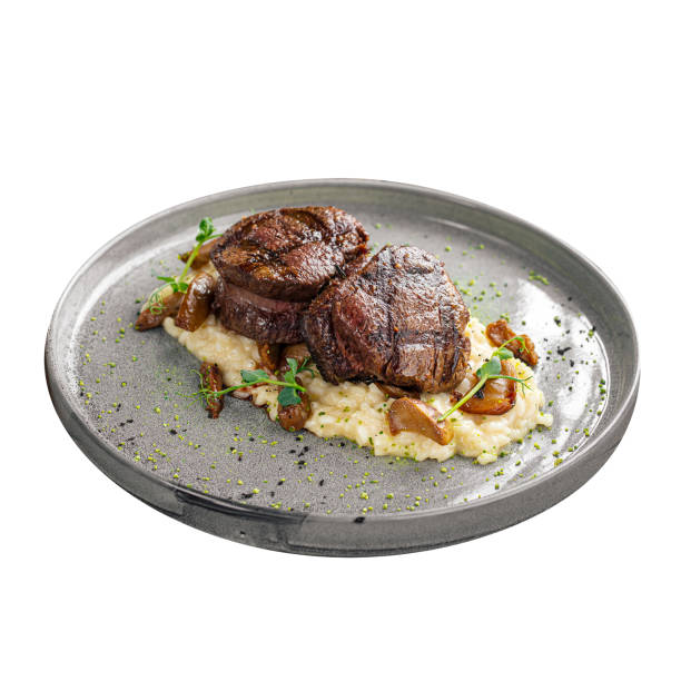 istock Gourmet veal medallions with risotto 1412995580