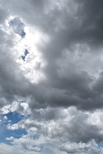 istock Cumulonimbus cloud formations on tropical blue sky 1412999162