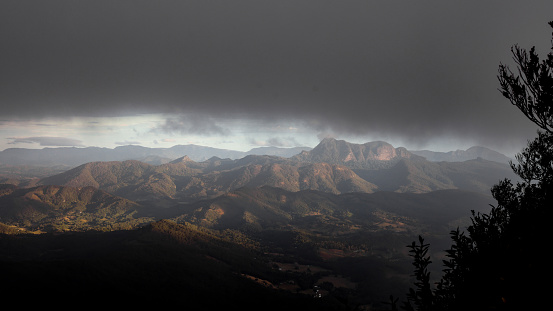 Heavy cloud of late afternoon over Wollumbin (Mt Warning) NSW, Australia