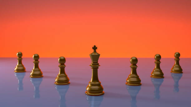 istock Several golden Chess Pawns lined up with the Chess King at the forefront, the concept of leadership in an organization 1413005843
