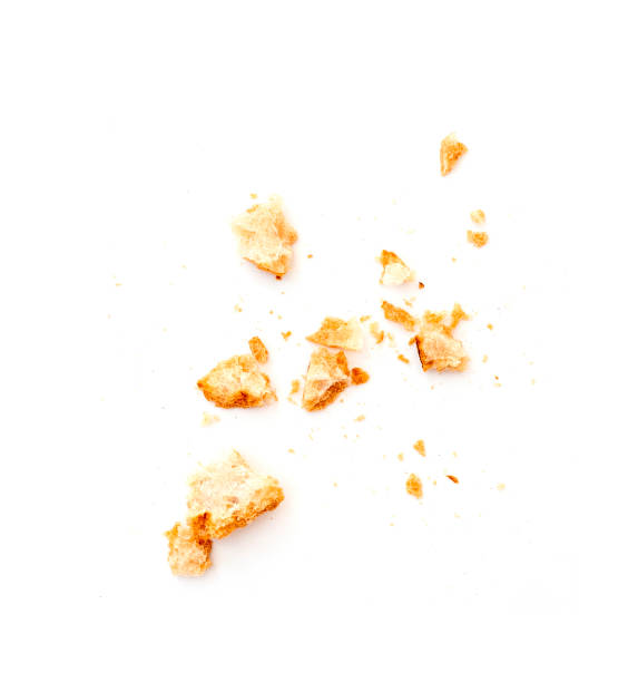 istock Dried crispy crumbs of white bread isolated on white 1413007745