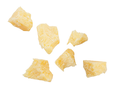 Pieces of fresh natural parmesan cheese isolated on white, clipping path