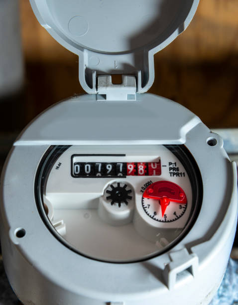 istock Close up of running water meter 1413009095
