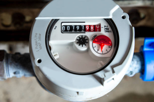 istock Close up of running water meter 1413009097