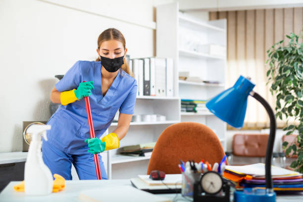 istock Woman cleaning floor with mop 1413012903