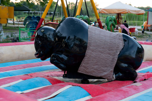 istock View of a mechanical bull machine with nobody 1413016301