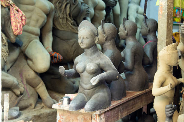 istock incomplete clay statue of goddess 1413016375