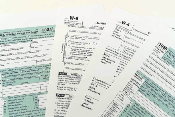 istock empty 1040 individual tax form ready to fill in office desk 1413016441