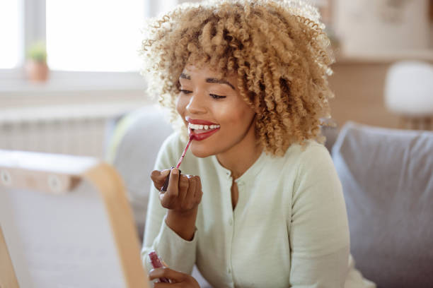 istock Finishing it off with a little gloss 1413019048