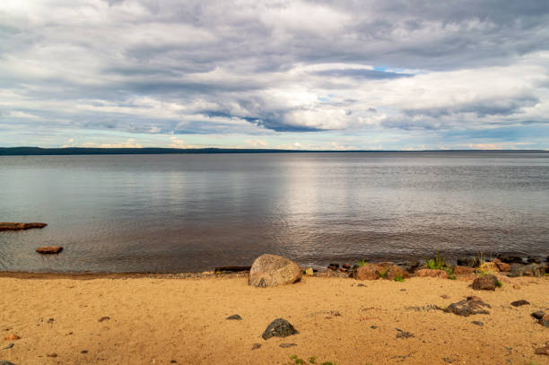 istock landscape with sandy shore of the lake 1413019574