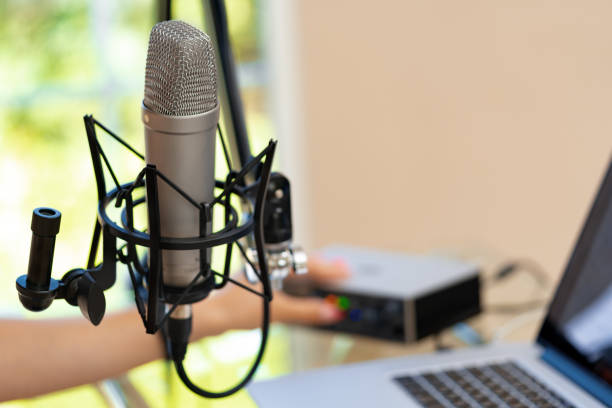 istock Unrecognizable young woman hands adjusting audio mixer setting sound in home studio close up 1413022592