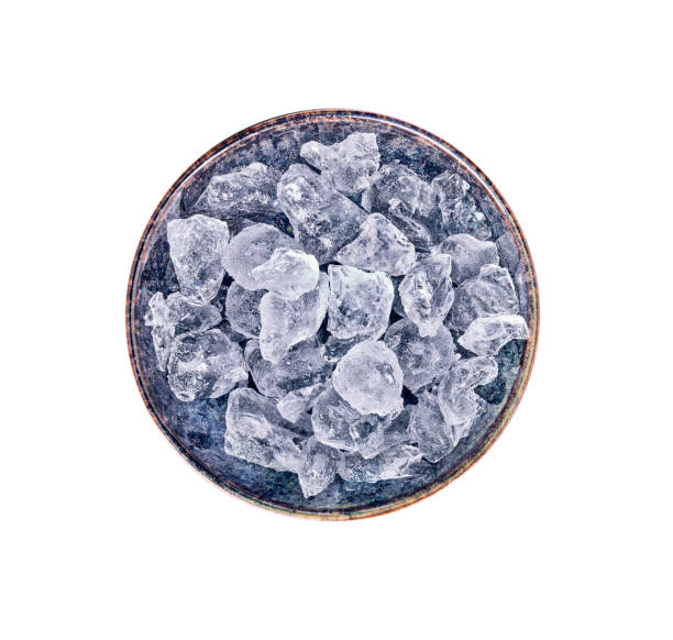 istock Ice cubes in bowl isolated on white background 1413023875