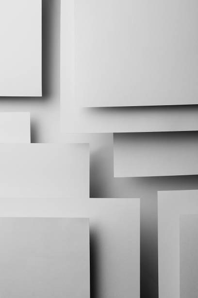 istock White abstract geometric background with white paper sheets soar as abstract spaces with rectangles, parallel stripes, perspective, shadows in simple strict modern style for business, vertical. 1413024921