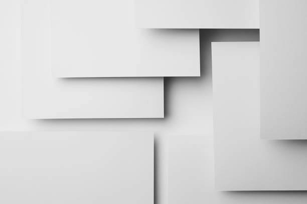 istock White rectangles paper spaces fly with shadows, glow, stripes as complex abstract geometric background in strict precize elegant minimal style for business card, poster, flyer. 1413024997