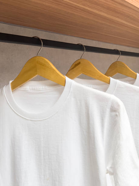 istock White t-shirt in wardrobe 1413033089